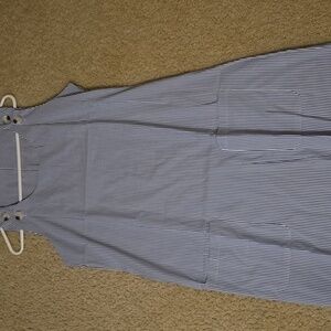 Blue and white stripped polyester and elastane dress size large. Never been worn
